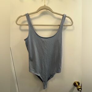 Blue body suit
